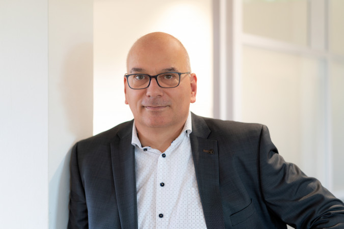 Portretfoto van Gert-Jan van den Berg, senior corporate finance adviseur